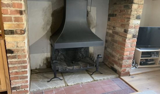 Traditional inglenook canopy and fire grate