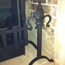 Clients antique dog irons and grate front re-worked to marry up to Thermovent high performance convecting open fire