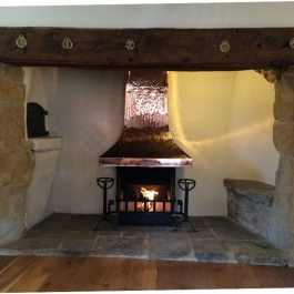 Hand beaten Copper Canopy in inglenook