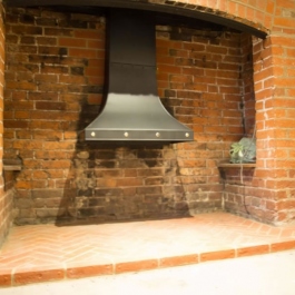 Hand made steel canopy with brass studs as requested by client for this Inglenook open fireplace. Canopy included a flue baffle control.