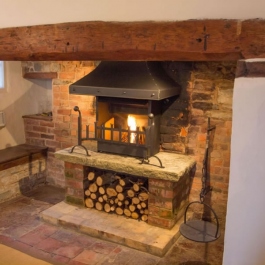 Traditional Open Fire with Wood Store Underneath