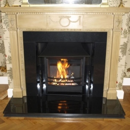 Rennovated polished granite fireplace with high perofrmance Thermovent open fire with built in convection system