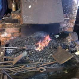 The forge used to hand craft our dog irons and grate fronts fired up and ready to go.