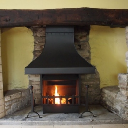 Thermovent convecting open fire installed in this small Inglenook open fireplace.