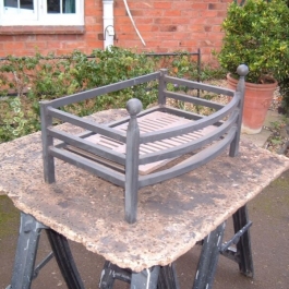 Traditional hand forged fire basket.