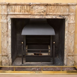 Unusual steel canopy in Georgian style on a Thermovent high performance wood burning open fire.