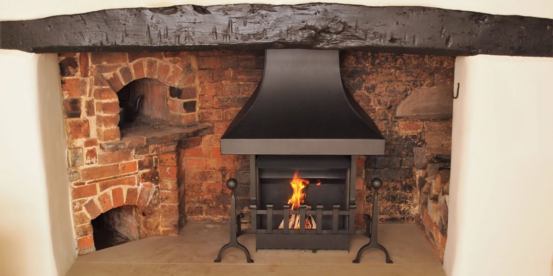 Thermovent and inglenook canopy in traditional fireplace