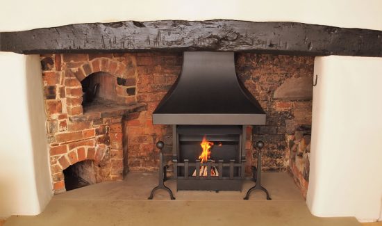 Thermovent and inglenook canopy in traditional fireplace