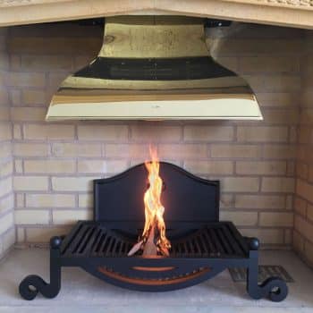 Hand made flat top fire with feature front set of ball top dogs and lowered curved accent designed.