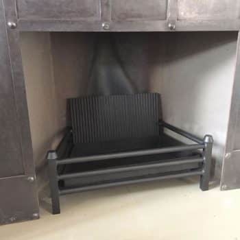 Three bar fire grate with integrate fire back