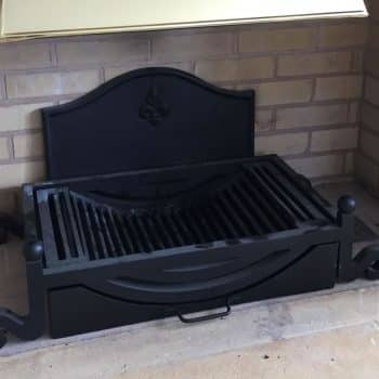 Integrated fire basket with ash tray and fire back