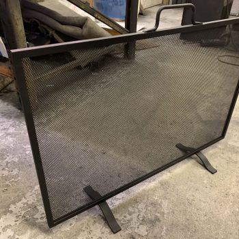 Plain free standing wire mesh fire guard.