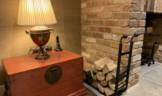 Bespoke fire accessories log cradle.