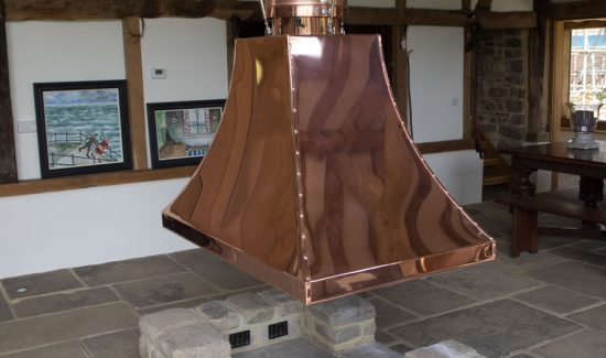 Large suspended inglenook copper canopy