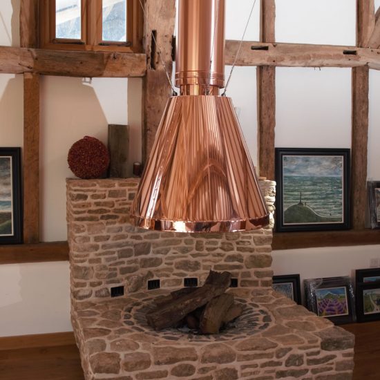 Suspended circular copper inglenook canopy