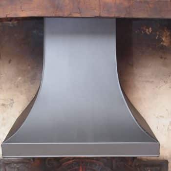 Steel inglenook canopy with rivet detailing