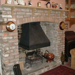 Original inglenook style canopy and fire basket.